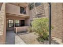 Community building with walkway and landscaping at 1245 W 1St St # 103, Tempe, AZ 85281