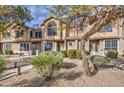 Two-story townhome showcasing a well-maintained exterior and landscaping at 13842 S 40Th St # 1004, Phoenix, AZ 85044