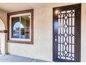 Front entry with decorative door and sidelight window at 1715 W Satinwood Dr, Phoenix, AZ 85045