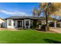 Newly remodeled home with a spacious lawn at 19819 N 6Th Dr, Phoenix, AZ 85027