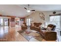 Bright and airy living room with vaulted ceilings, fireplace, and large windows at 2131 W Ironwood Dr, Chandler, AZ 85224