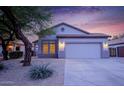 One story house with a two car garage and desert landscaping at 2304 S Abbey --, Mesa, AZ 85209