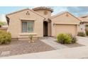 Two-story house with a two-car garage and nicely landscaped front yard at 2528 W Brookhart Way, Phoenix, AZ 85085