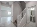 Staircase with a modern railing leading to the second floor at 2575 E Bluff Spring Ave, Apache Junction, AZ 85119