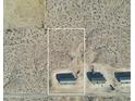 Aerial view of a manufactured home on a desert homesite with a defined property boundary at 2693 S 357Th Dr, Tonopah, AZ 85354