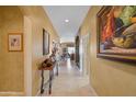 Bright and spacious entryway with artwork and console table at 4202 S Cordia Ct, Gold Canyon, AZ 85118