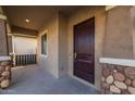 Exterior front door entry to a beautiful home with stone accents at 4267 E Bernice St, Gilbert, AZ 85295