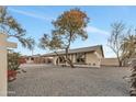 Cute ranch home with a gravel front yard and basketball hoop at 4901 E Sheridan St, Phoenix, AZ 85008