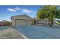 Two-story home with a three-car garage and well-maintained landscaping at 5424 N 186Th Dr, Litchfield Park, AZ 85340