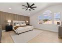 Spacious main bedroom with wood-look floors and large windows at 8134 E Rita Dr, Scottsdale, AZ 85255