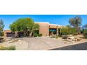 Elegant stucco home with landscaped desert gardens at 11264 E Apache Vistas Dr, Scottsdale, AZ 85262