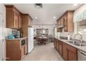 Open kitchen features ample counter space and a dining area at 1417 S Grand Dr, Apache Junction, AZ 85120