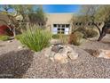 Landscaped backyard with a small water feature and rocks at 15234 E Sundown Dr, Fountain Hills, AZ 85268