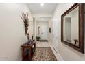 Spacious entryway with a large mirror and a console table at 24211 N 168Th Ln, Surprise, AZ 85387