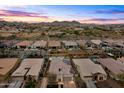 Enjoy picturesque mountain views from this home nestled within a serene community at 25891 N 104Th Dr, Peoria, AZ 85383