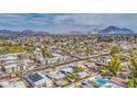 Aerial view of a residential neighborhood near mountains at 2937 E Osborn Rd, Phoenix, AZ 85016