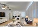 Bright living room with white couches and a modern feel at 2937 E Osborn Rd, Phoenix, AZ 85016