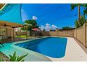 Inviting swimming pool with a patio and backyard at 4016 W Myrtle Ave, Phoenix, AZ 85051