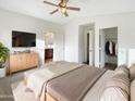 Large main bedroom with a walk-in closet and ensuite bathroom at 6038 S Connie Ln, Gilbert, AZ 85298