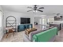Open concept living area with a modern aesthetic and kitchen view at 6808 E Loma Land Dr, Scottsdale, AZ 85257