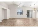 Spacious living room with tile flooring and a sliding glass door at 7238 S 38Th Pl, Phoenix, AZ 85042