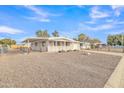 Attractive single story home with covered patio and fenced yard at 7648 E Holmes Ave, Mesa, AZ 85209