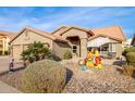 House exterior with festive decorations and a two-tone color scheme at 16813 S 37Th Way, Phoenix, AZ 85048