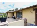 Home's front entry with stone accents and welcoming porch at 1707 E Mclellan Blvd, Phoenix, AZ 85016