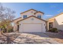 Two-story house with a large driveway and landscaped yard at 18204 N 11Th Dr, Phoenix, AZ 85023