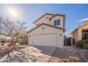 Two-story house with a large driveway and landscaped yard at 18204 N 11Th Dr, Phoenix, AZ 85023