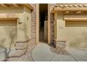 Building entrance with stone accents and a walkway leading to stairs at 21320 N 56Th St # 2043, Phoenix, AZ 85054