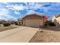 Single story home with a two-car garage and desert landscaping at 22516 N Via De La Caballa --, Sun City West, AZ 85375