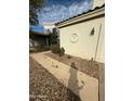 House exterior showcasing a walkway and landscaping at 2322 S Rogers -- # 9, Mesa, AZ 85202