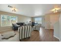 Living room with hardwood floors and neutral decor at 277 E Windsor Ct, Gilbert, AZ 85296