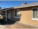 Tan house with front entrance and yard at 4854 W Berkeley Rd, Phoenix, AZ 85035