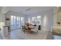 Bright dining room with sliding doors leading to a patio at 7462 E Visao Dr, Scottsdale, AZ 85266