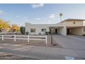 Cute single story home with white picket fence at 7749 E Coolidge St, Scottsdale, AZ 85251