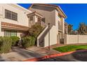 Spanish-style condo building with stairs and landscaping at 7800 E Lincoln Dr # 2092, Scottsdale, AZ 85250