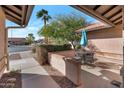 Relaxing patio with seating area, perfect for enjoying the Arizona sunshine at 859 N 54Th Cir, Mesa, AZ 85205