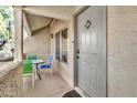 Condo entry with private patio and seating area at 1331 W Baseline Rd # 316, Mesa, AZ 85202