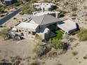 Unique architectural home with expansive backyard and patio at 14425 S Canyon Dr, Phoenix, AZ 85048