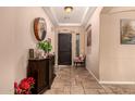 Bright and spacious entryway with tile flooring and decorative accents at 1819 W Magdalena Ln, Phoenix, AZ 85041