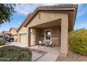 Front porch with seating area, a great place to relax at 22568 W Gardenia Dr, Buckeye, AZ 85326