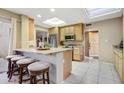 Well-equipped kitchen with granite counters and island at 25836 N Primo Cir, Rio Verde, AZ 85263
