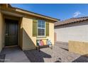 Inviting front entry with a bench and landscaping at 3244 W Cedar Ridge Rd, Phoenix, AZ 85083
