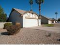 View of the garage and a portion of the community at 1636 E Juanita Ave, Mesa, AZ 85204