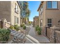 Landscaped walkway with stairs leading to homes at 21809 N 39Th St, Phoenix, AZ 85050