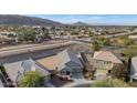 House nestled in a residential neighborhood with mountain views at 2405 E Beverly Rd, Phoenix, AZ 85042