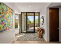 Bright and spacious entryway with large windows and modern decor at 39349 N 107Th Way, Scottsdale, AZ 85262