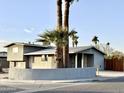 House with two palm trees in front at 4902 W Cypress St, Phoenix, AZ 85035